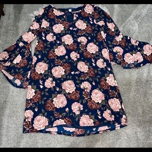 Navy floral dress with open arms